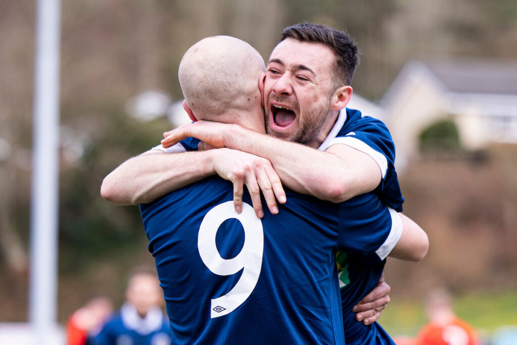 Craig Pritchard of Denbigh Town celebrates scoring his sides second goal. Bridgend Street v Denbigh Town in the FAW Amateur Trophy at Victoria Park on the 18th March 2023